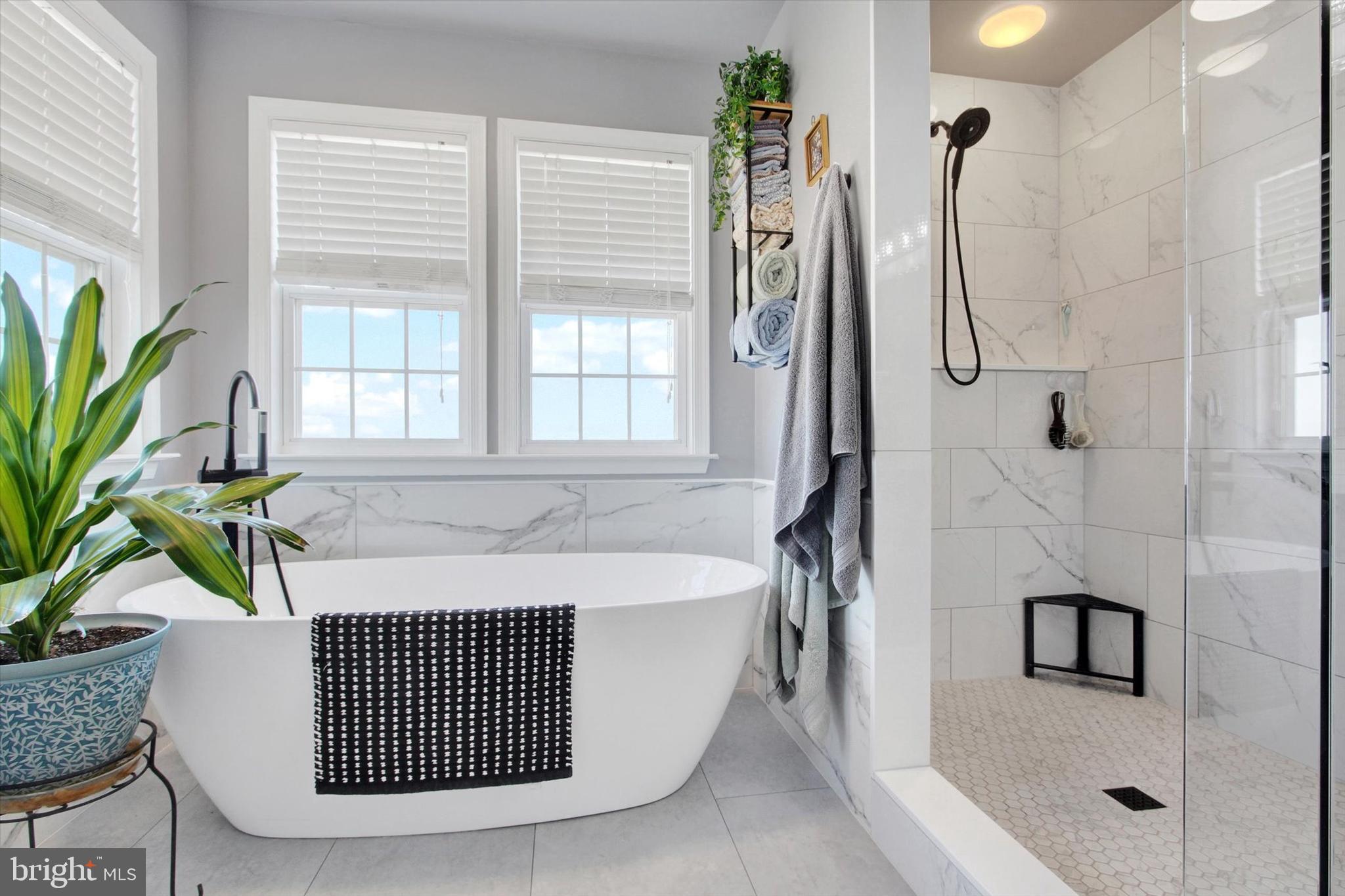 123 Colton Court Smithsburg, MD 21783 - Photo 29 of 60 a bath tub sitting next to a window