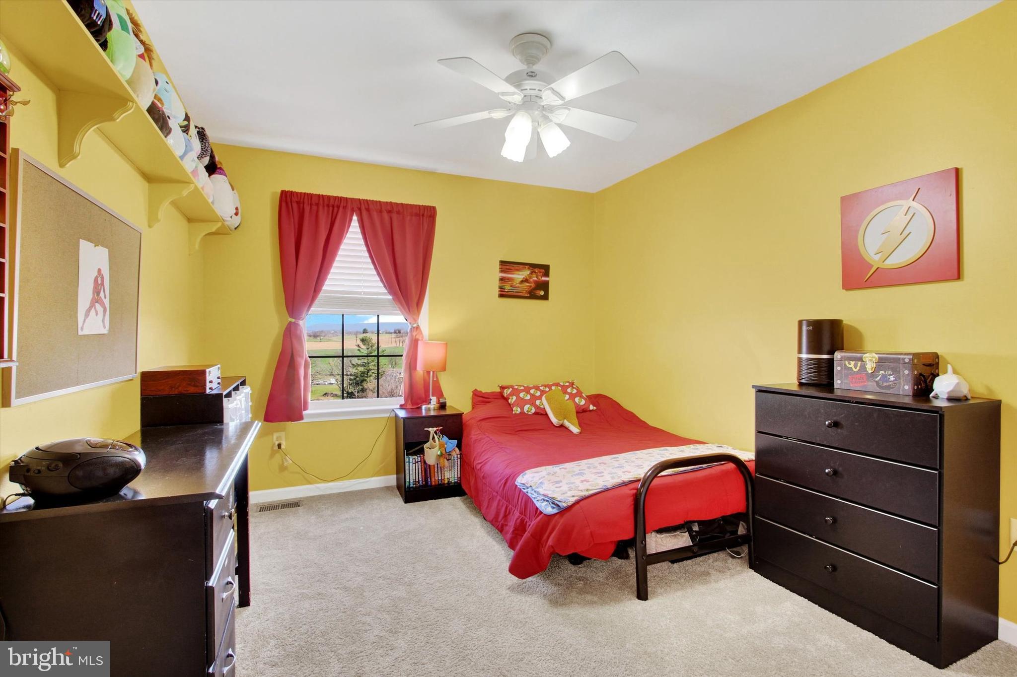 123 Colton Court Smithsburg, MD 21783 - Photo 31 of 60 a bedroom with a bed and a couch