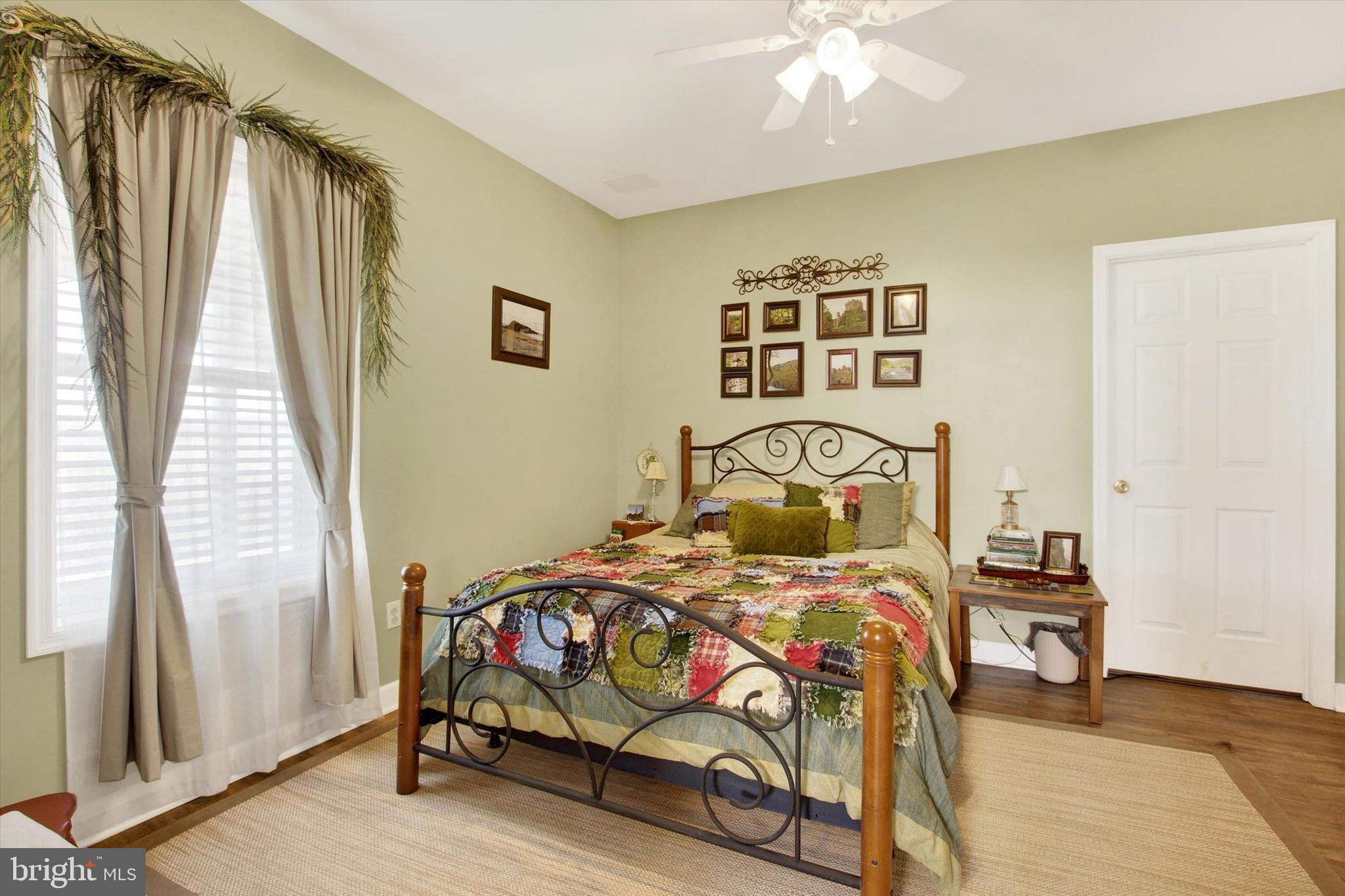 123 Colton Court Smithsburg, MD 21783 - Photo 37 of 60 a bedroom with a bed and a window