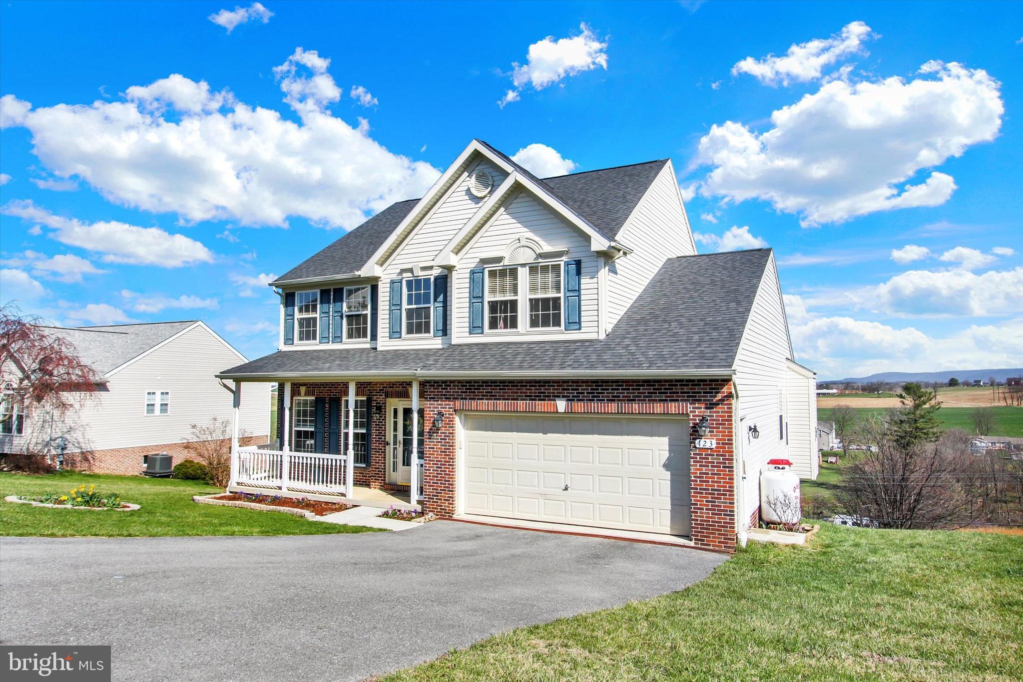 123 Colton Court Smithsburg, MD 21783 - Photo 60 of 60 a front view of a house with a yard and garage