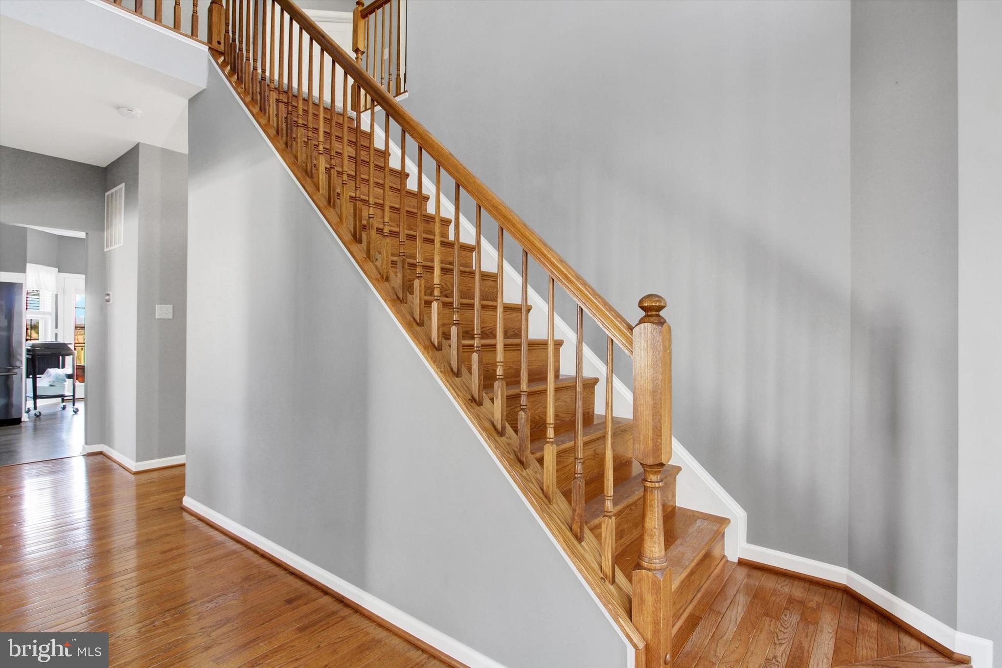 123 Colton Court Smithsburg, MD 21783 - Photo 8 of 60 a view of staircase with wooden floor and stairs