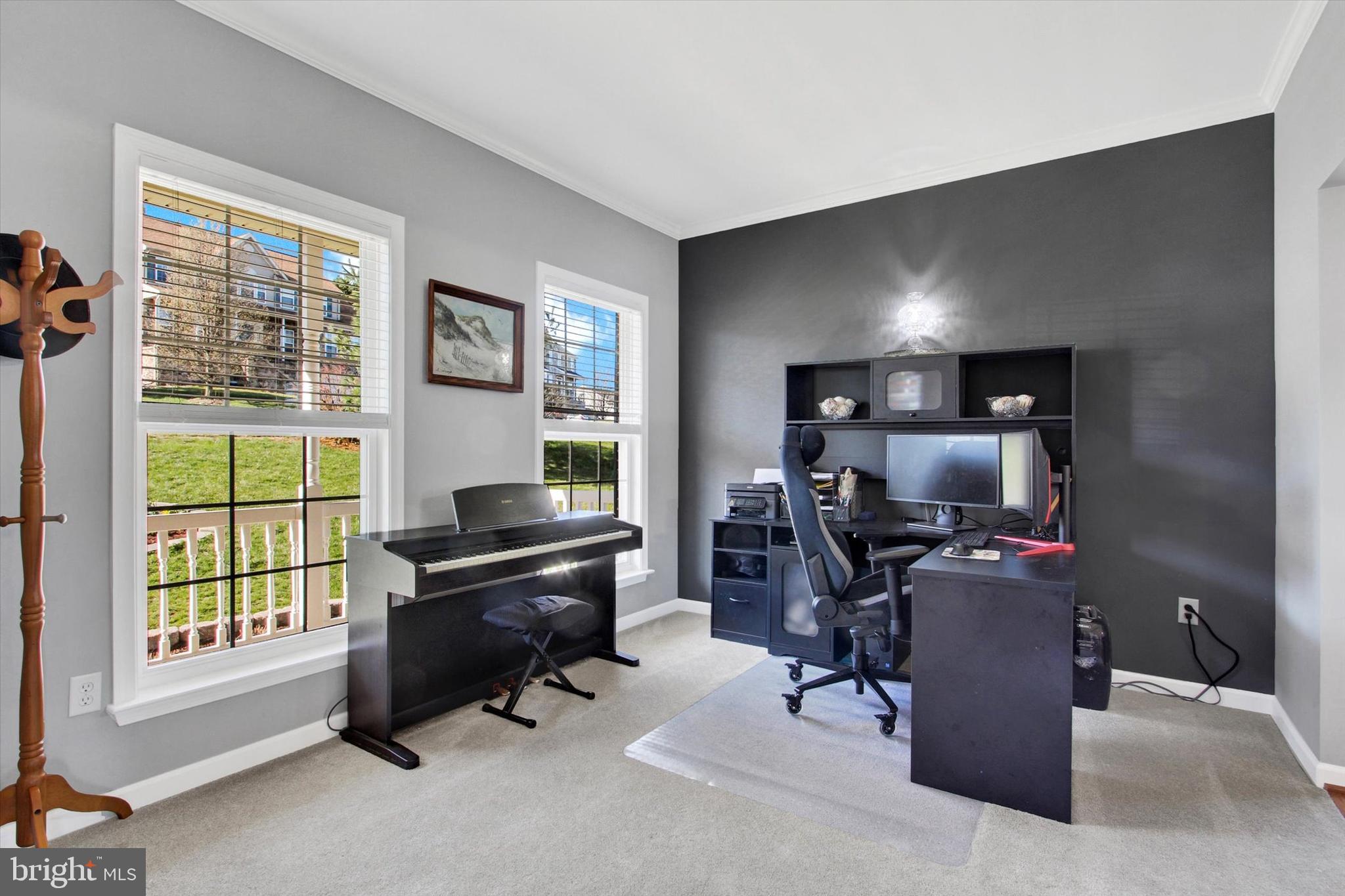 123 Colton Court Smithsburg, MD 21783 - Photo 9 of 60 a view of a workspace with furniture and a window