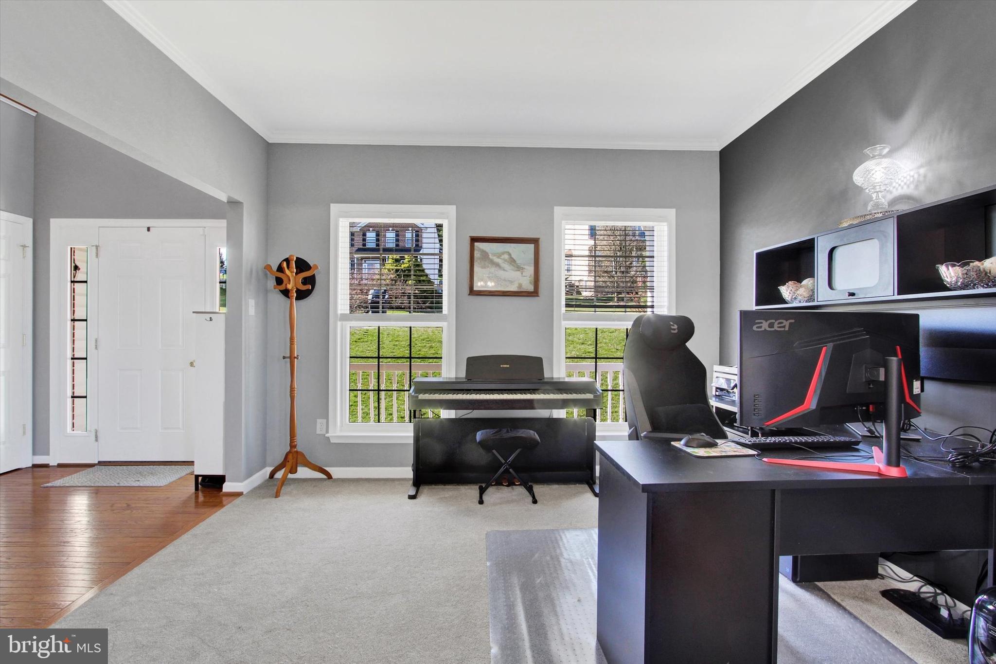 123 Colton Court Smithsburg, MD 21783 - Photo 10 of 60 a view of a workspace with furniture and a window