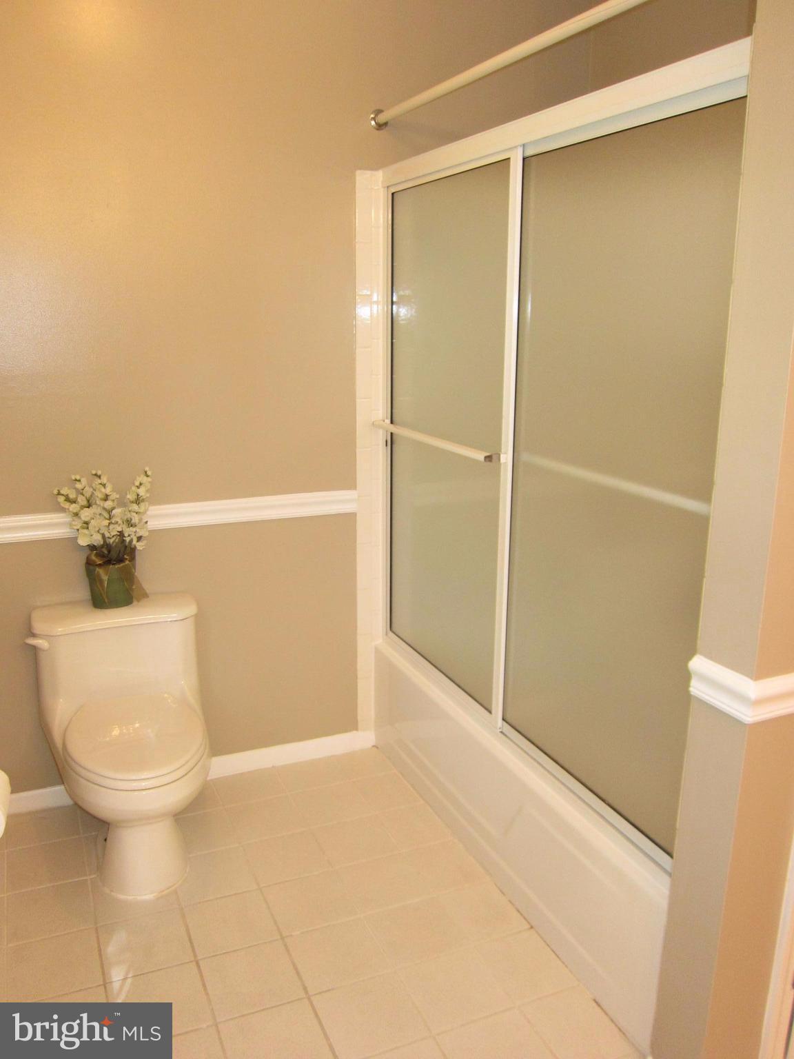 15005 Wellwood Road Silver Spring, MD 20905 - Photo 22 of 30 Extra large hall bath, glass doors