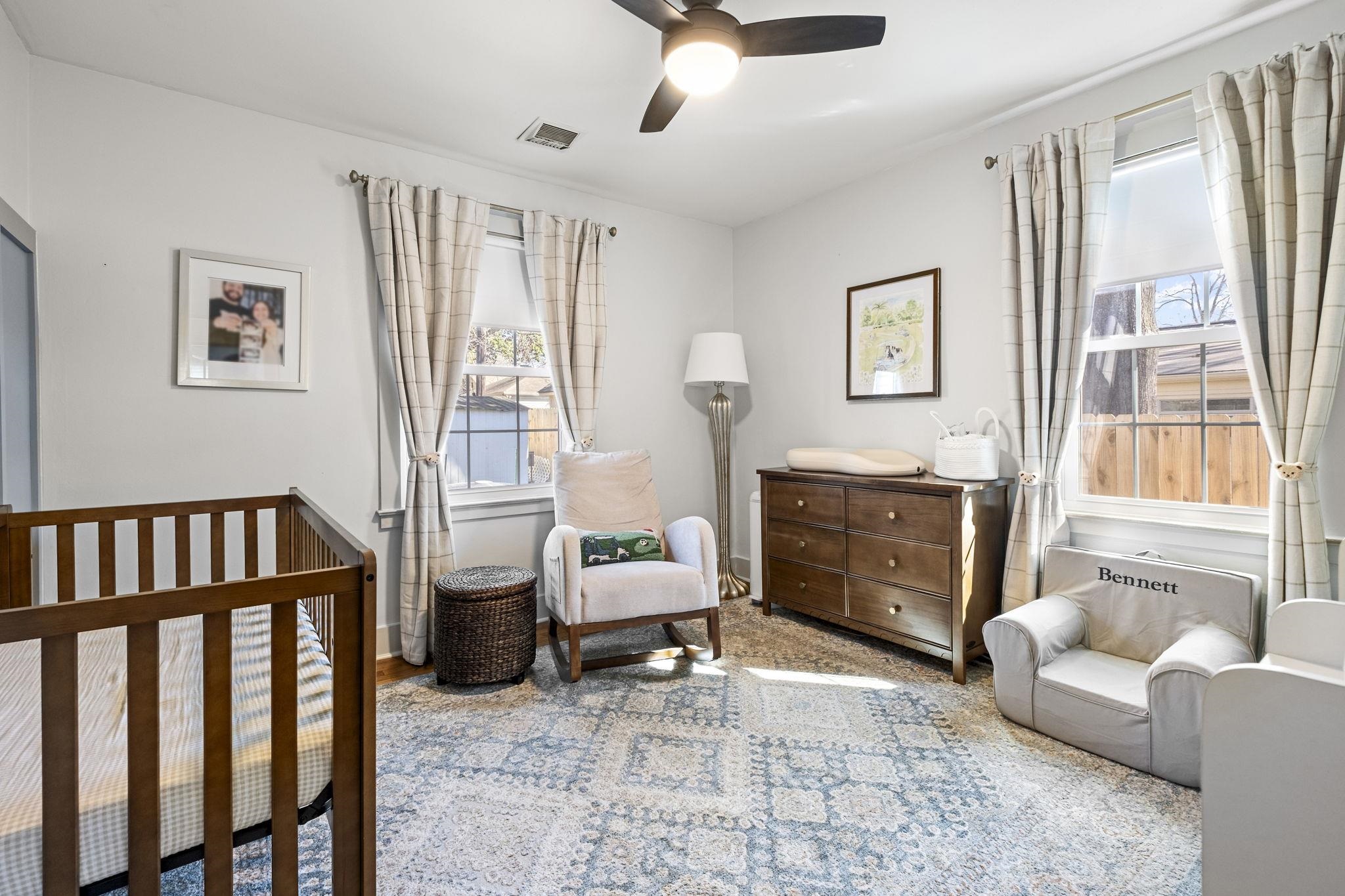 4120 Village Road Memphis, TN 38117 - Photo 17 of 28 Bedroom with a crib and ceiling fan