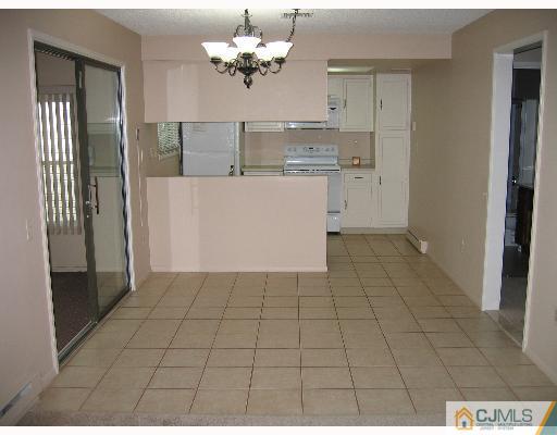 32 A Haddon Road Monroe Township, NJ 08831 - Photo 2 of 8 a view of kitchen with granite countertop cabinets