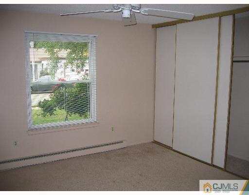 32 A Haddon Road Monroe Township, NJ 08831 - Photo 6 of 8 a view of empty room with window