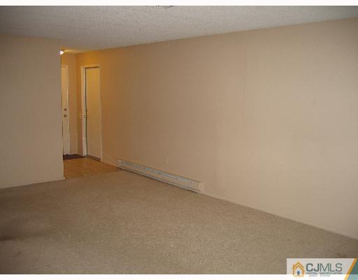 32 A Haddon Road Monroe Township, NJ 08831 - Photo 8 of 8 a view of an empty room
