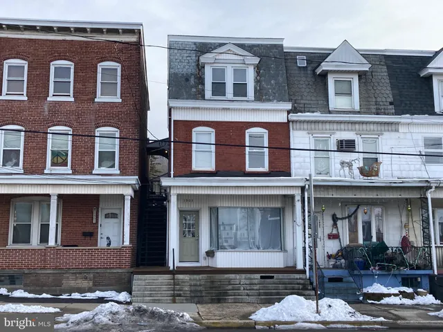 a front view of a house with balcony