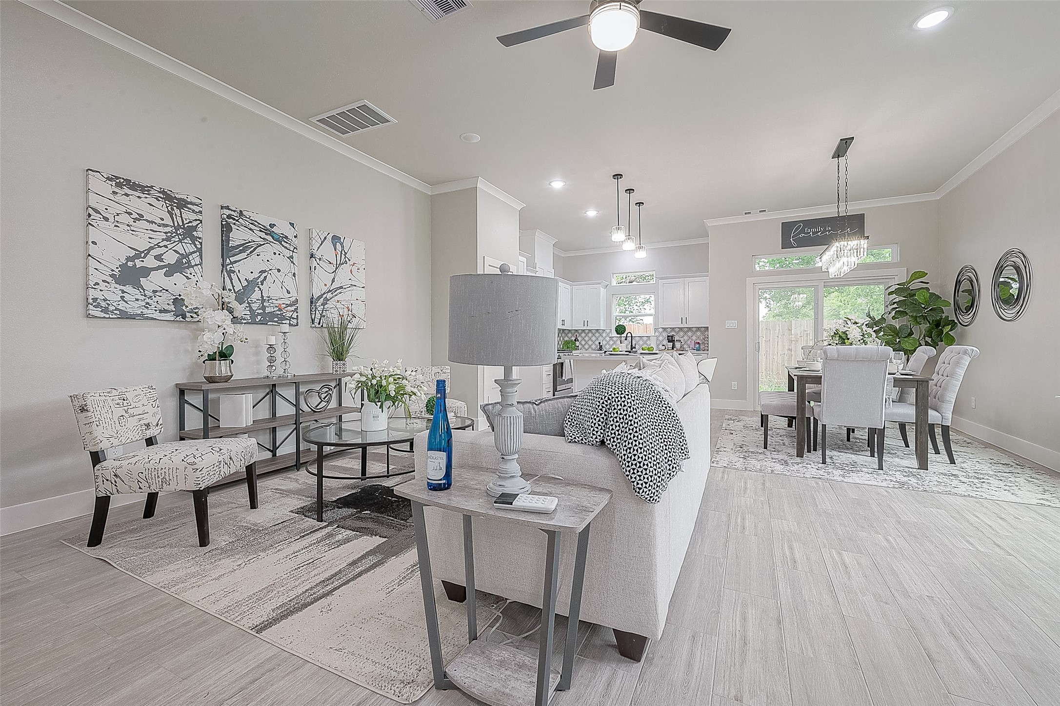 7108 St Augustine Street Houston, TX 77021 - Photo 3 of 21 a living room with furniture and a chandelier