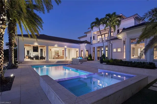 a view of a brick building with a yard