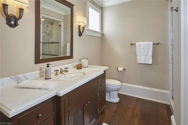 a kitchen with a sink a cabinets and window