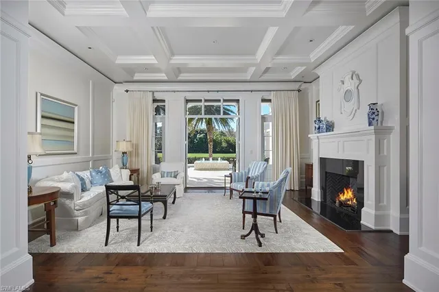 a view of a dining room with furniture and window