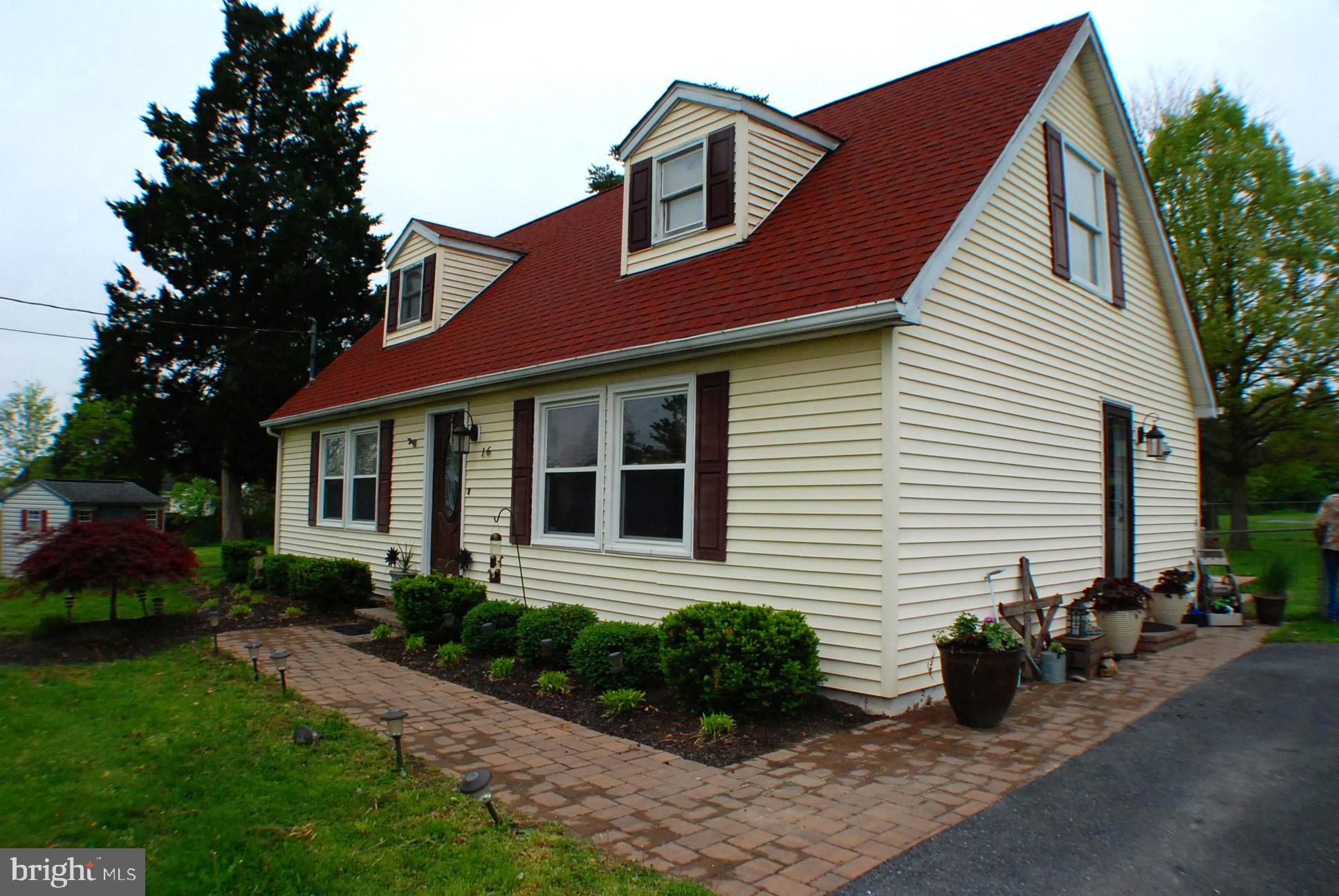 16 Truman Road Inwood, WV 25428 - Photo 29 of 30 Front patio with nice landscaping