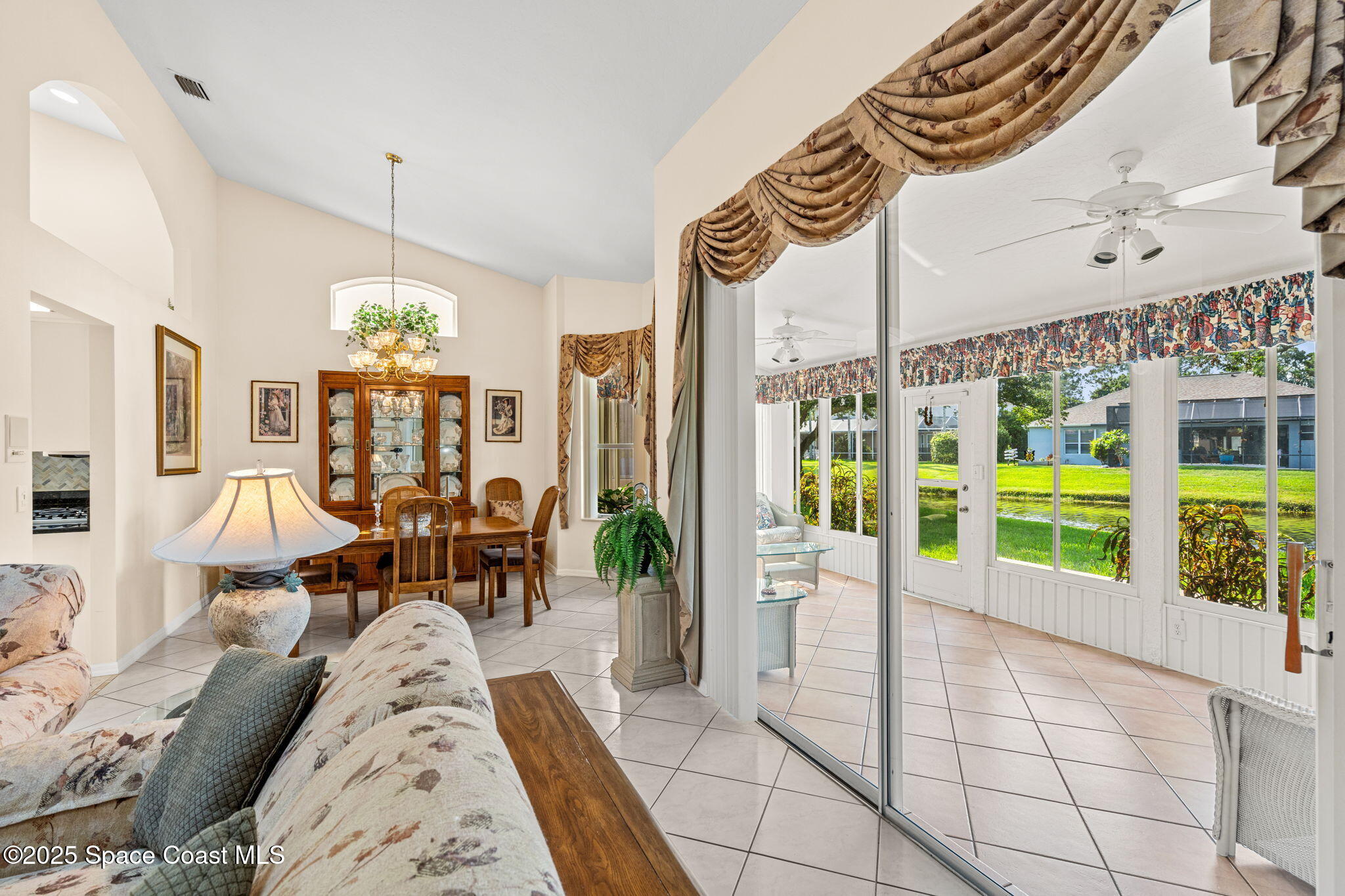 7702 Candlewick Drive Melbourne, FL 32940 - Photo 13 of 37 a living room filled with furniture
