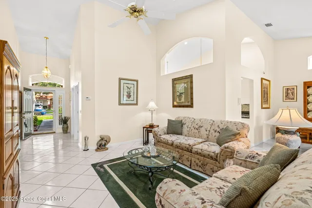 a living room with furniture and a couch