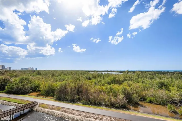 a view of a yard with sunset view
