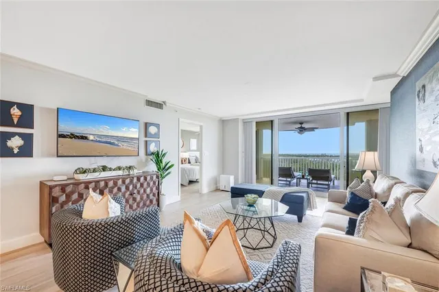 a living room with furniture or couch and a window