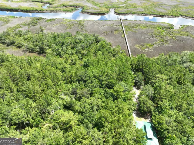 a view of a swimming pool with an outdoor space