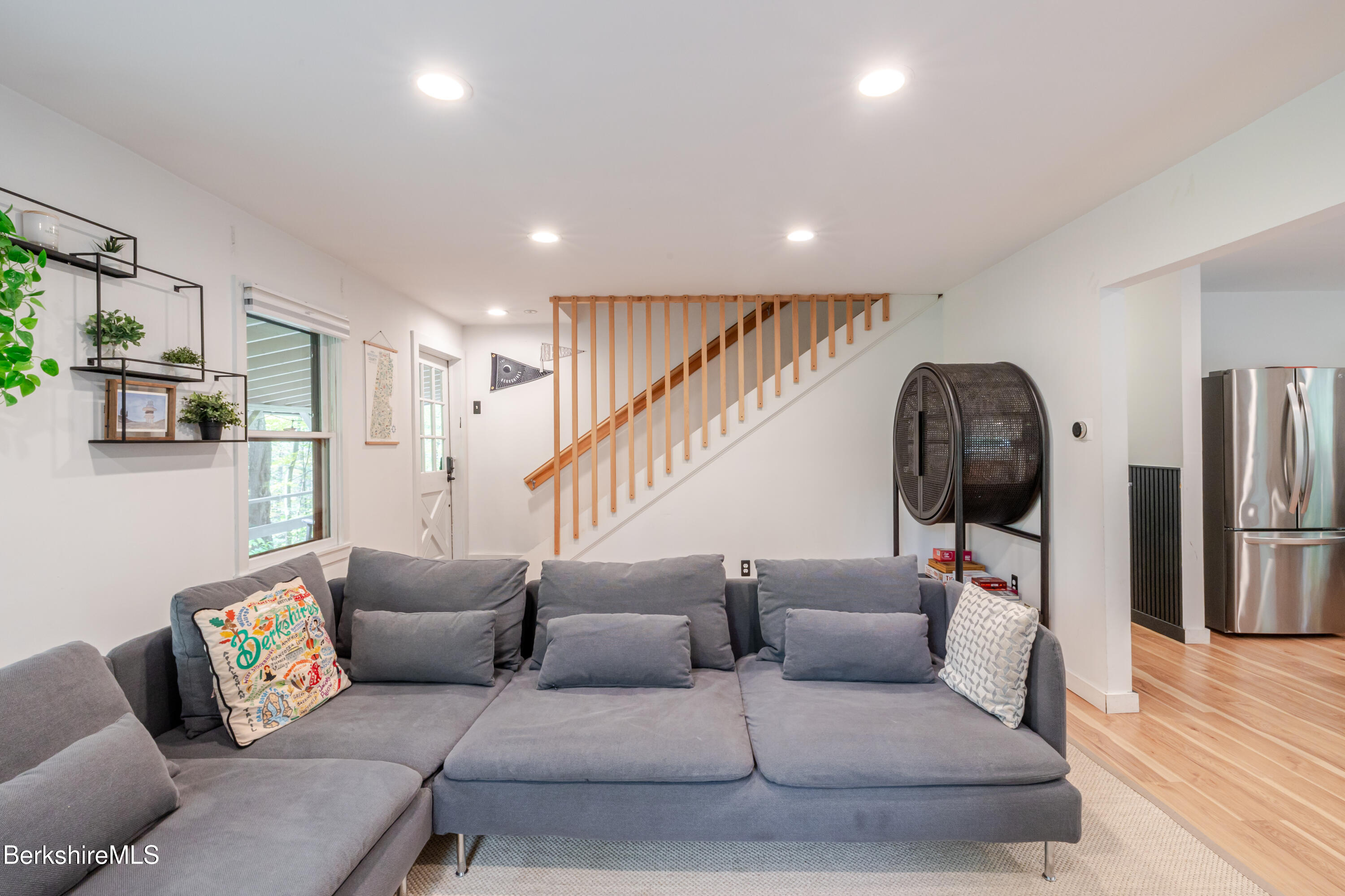 176 Division Street Great Barrington, MA 01230 - Photo 14 of 40 a living room with furniture and a wooden floor
