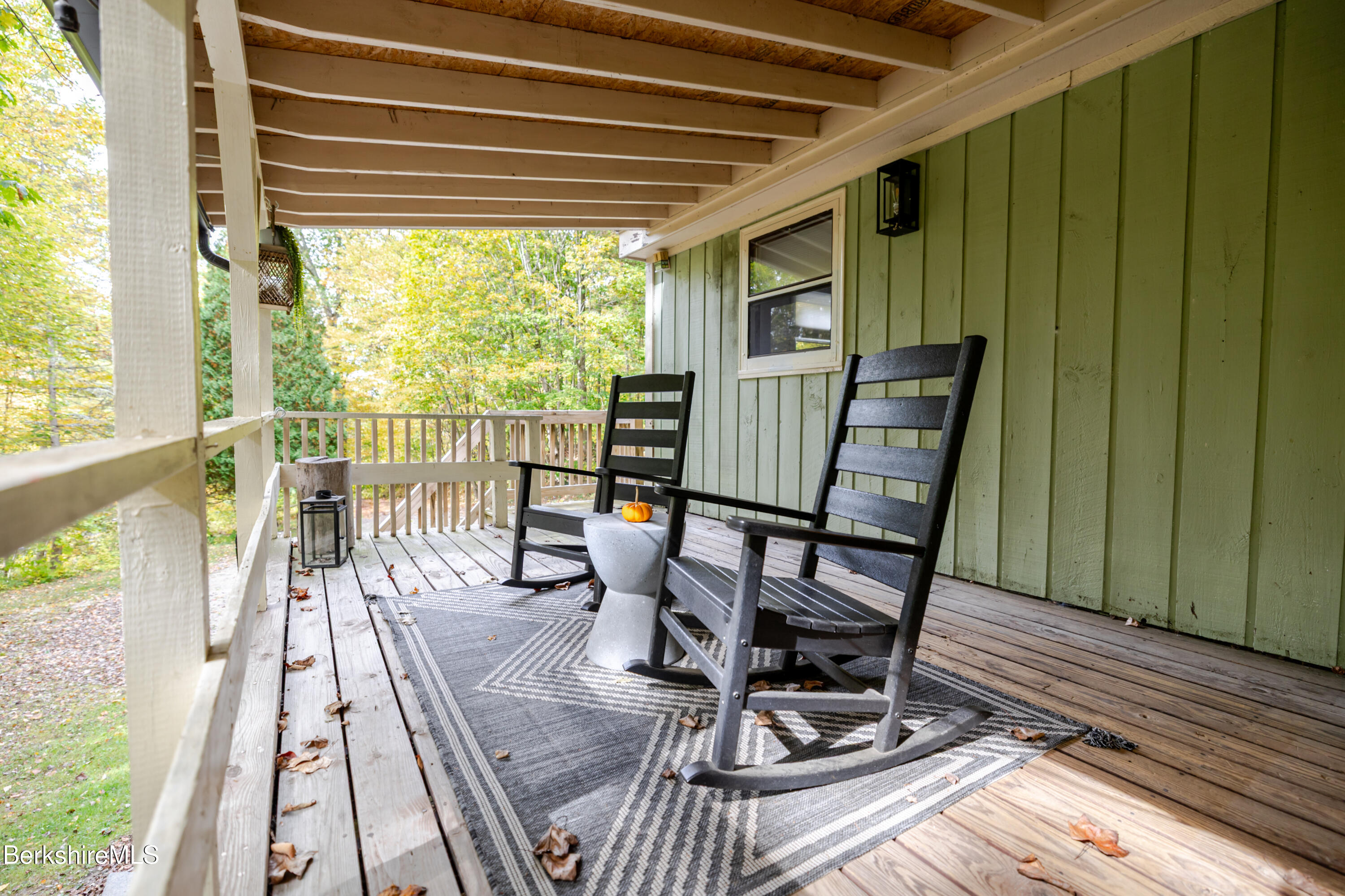 176 Division Street Great Barrington, MA 01230 - Photo 15 of 40 a view of a chairs in balcony