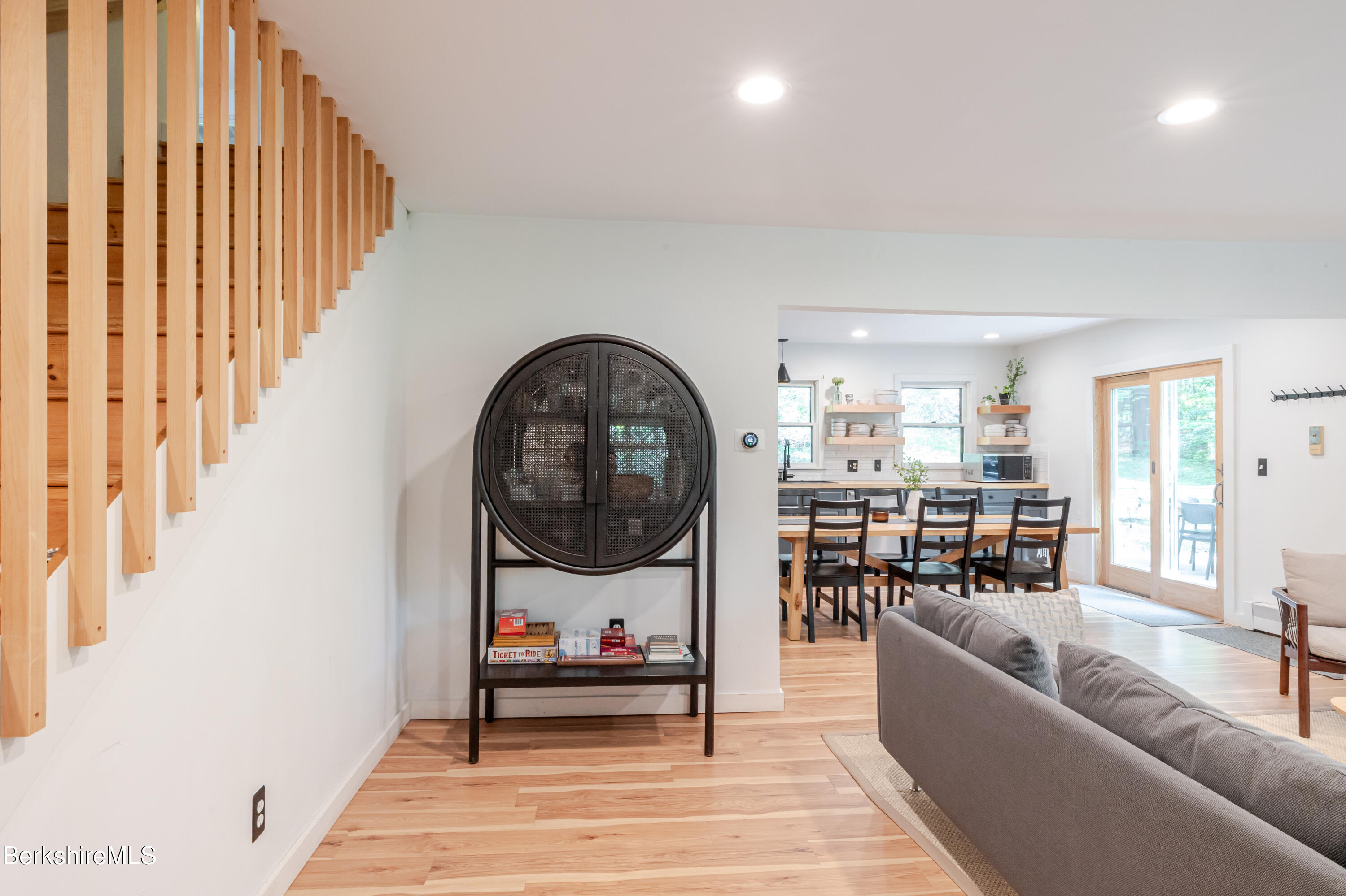 176 Division Street Great Barrington, MA 01230 - Photo 24 of 40 a living room with furniture and a wooden floor