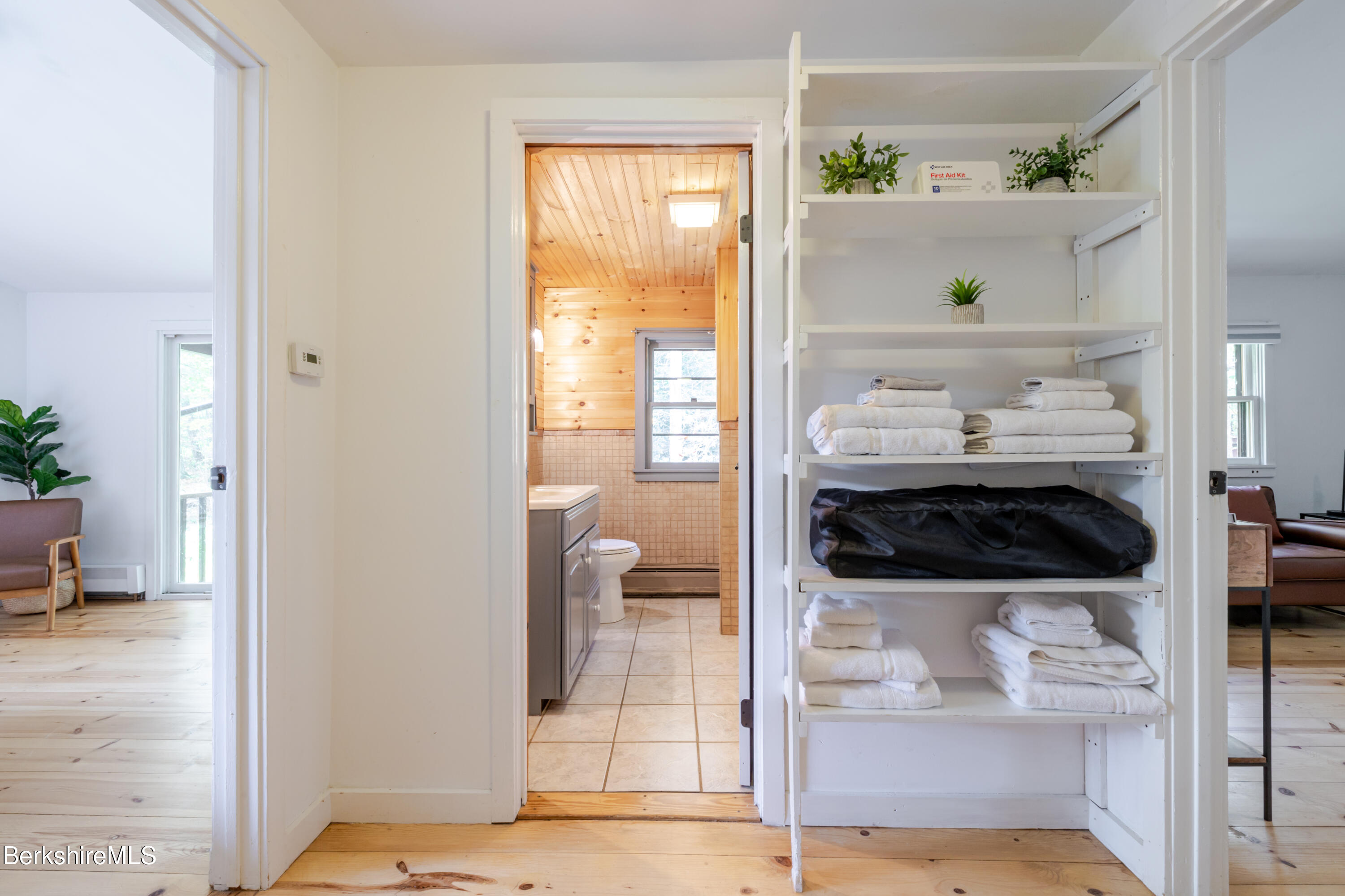 176 Division Street Great Barrington, MA 01230 - Photo 25 of 40 a kitchen with a refrigerator and a window
