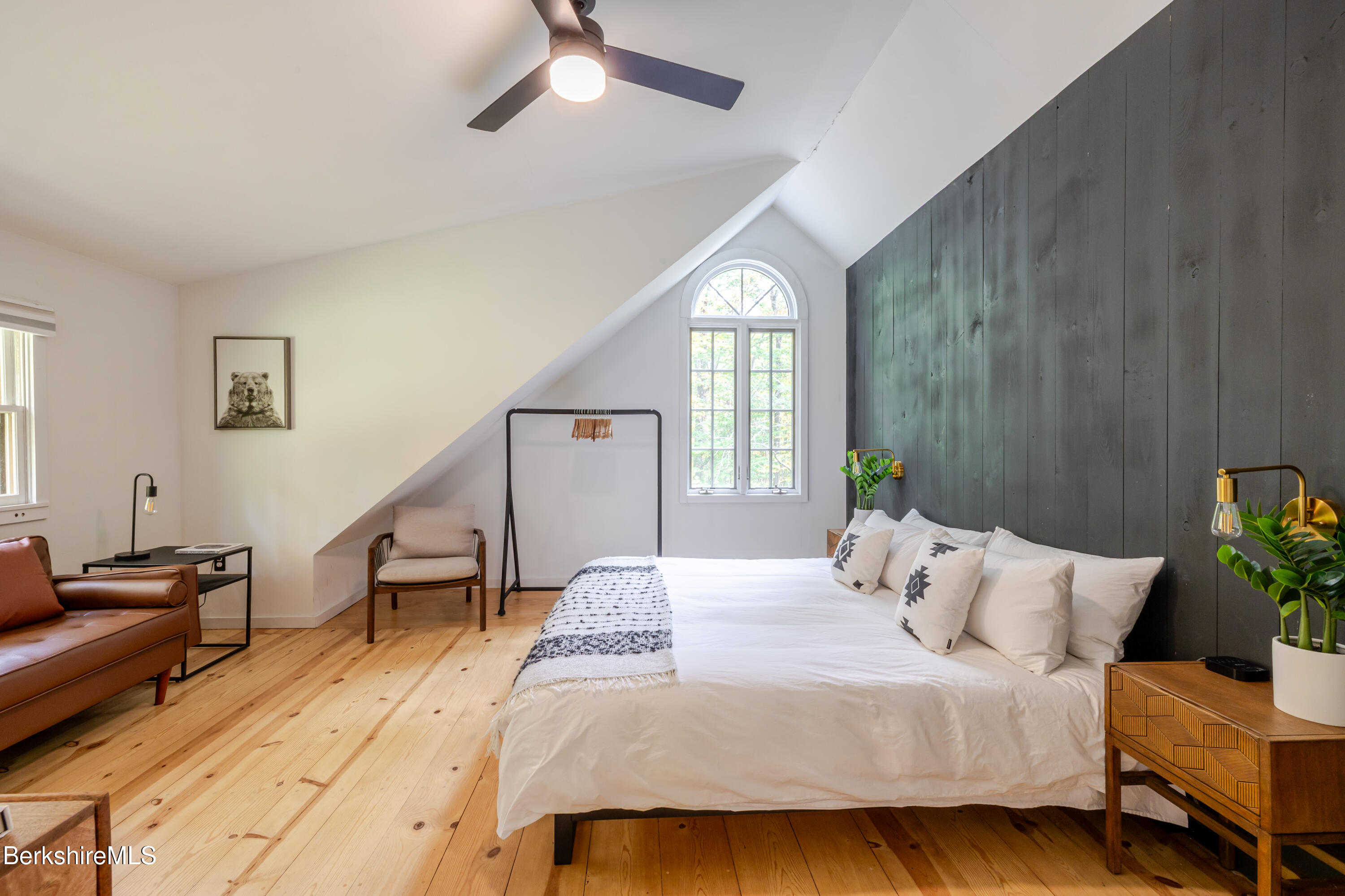 176 Division Street Great Barrington, MA 01230 - Photo 30 of 40 a bedroom with a bed table and window