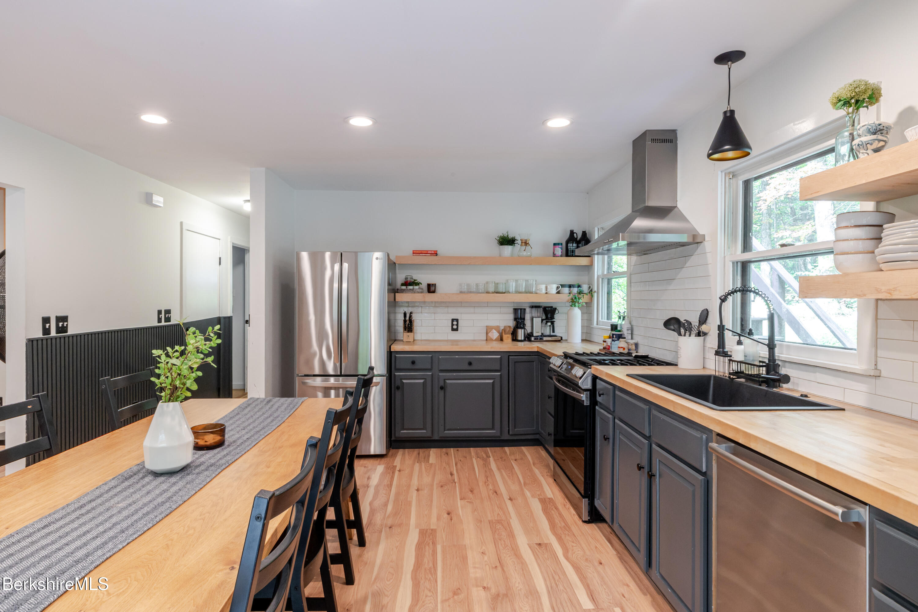 176 Division Street Great Barrington, MA 01230 - Photo 6 of 40 a kitchen with granite countertop lots of counter top space and stainless steel appliances