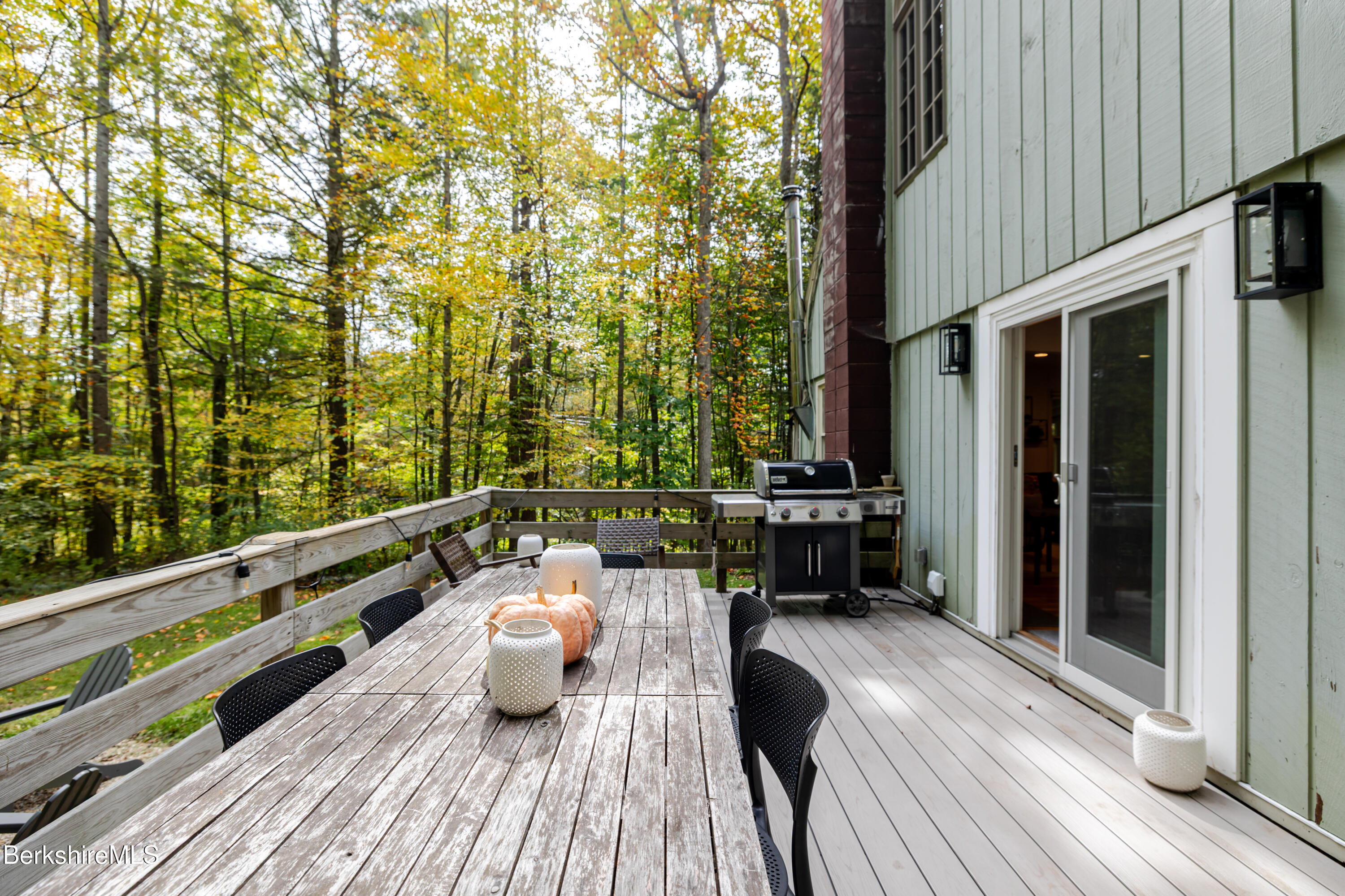 176 Division Street Great Barrington, MA 01230 - Photo 9 of 40 a view of balcony with chairs and wooden floor