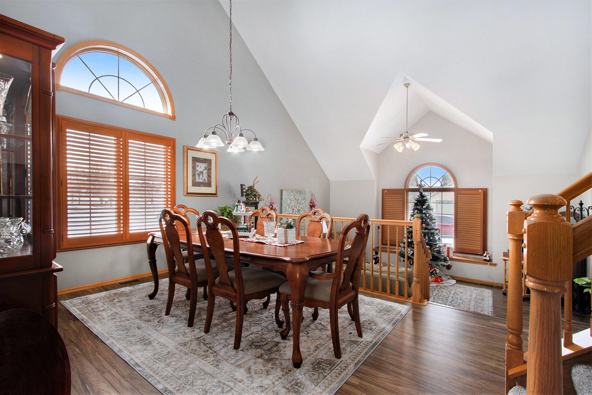10399 Pike Street Crown Point, IN 46307 - Photo 4 of 25 a view of a a dining room with furniture window and wooden floor
