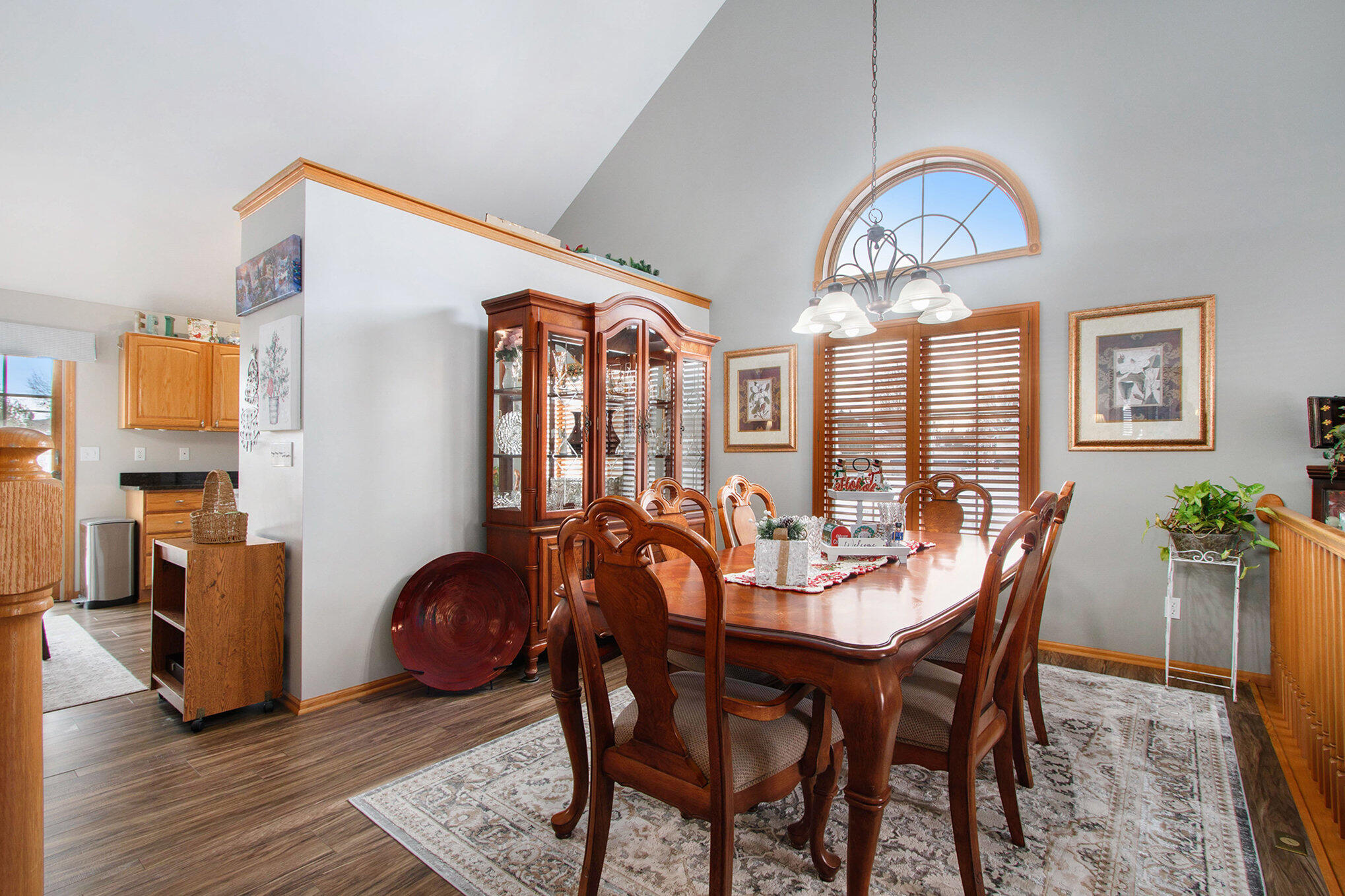 10399 Pike Street Crown Point, IN 46307 - Photo 5 of 25 a view of a dining room with furniture window and wooden floor