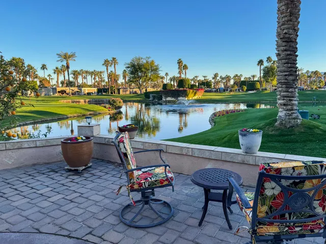 a view of a terrace with sitting area