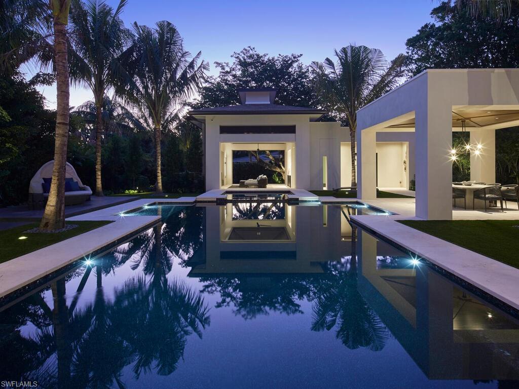 477 3rd Street North Naples, FL 34102 - Photo 32 of 33 a view of a house with a wooden deck