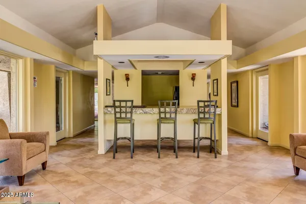 a view of a livingroom with furniture and windows