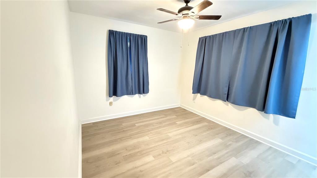6310 Lake Underhill Road, Unit A Orlando, FL 32807 - Photo 11 of 12 a view of an empty room with a window