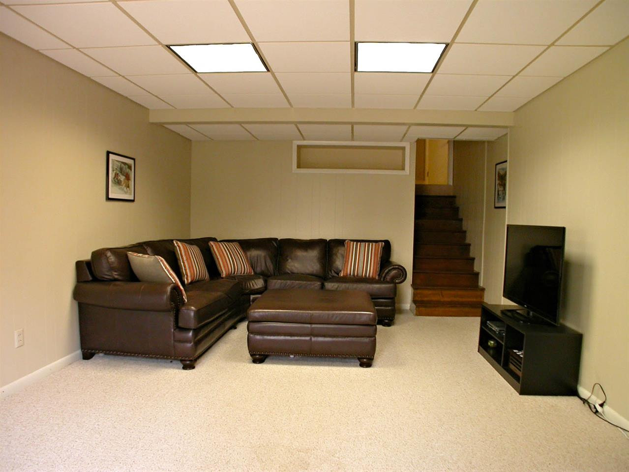 4709 Wedgewood Street Raleigh, NC 27612 - Photo 22 of 25 Lower level walk out recreational room that can be used for an in-law suite or entertaining area. Lower Level