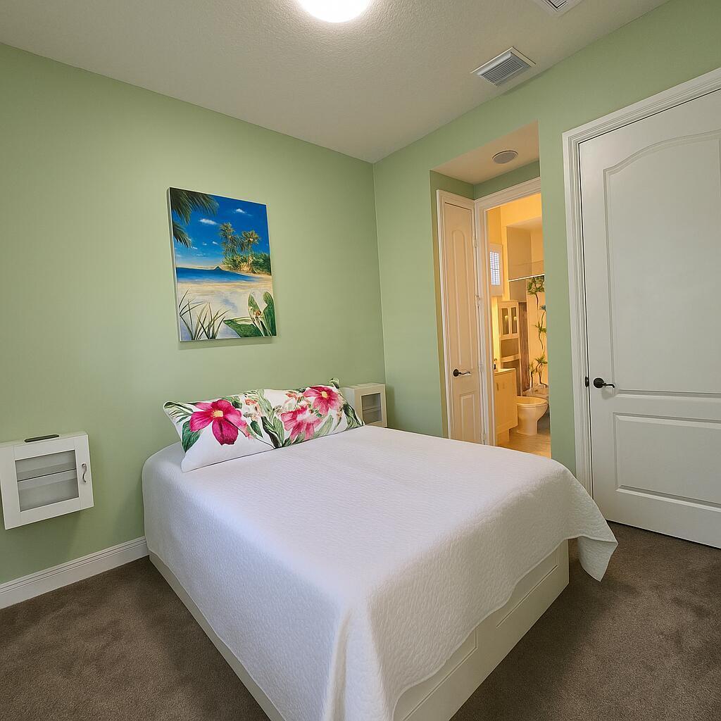 108 Spikerush Road Jupiter, FL 33458 - Photo 24 of 37 Retreat Bedroom