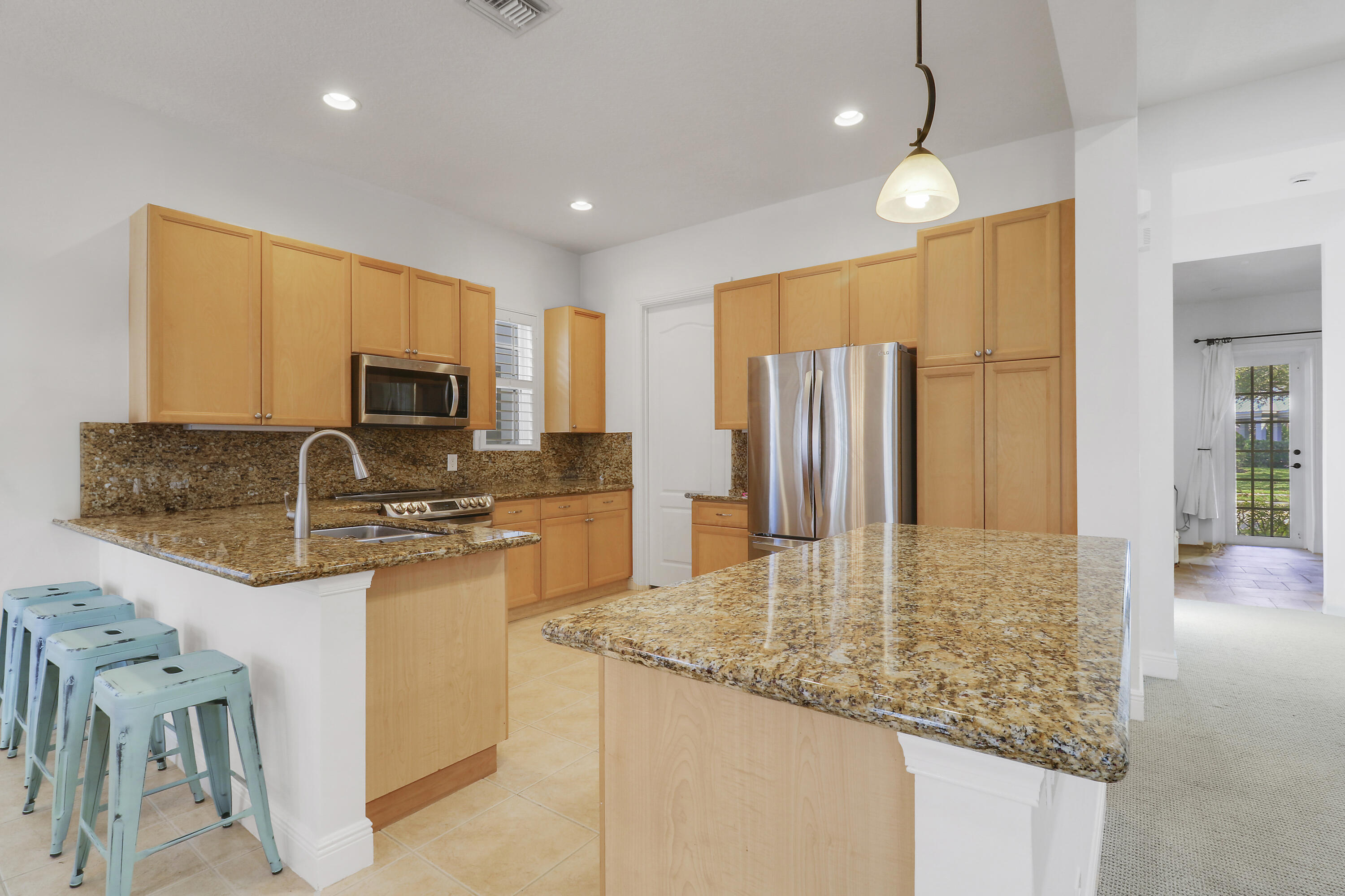 108 Spikerush Road Jupiter, FL 33458 - Photo 4 of 37 Kitchen