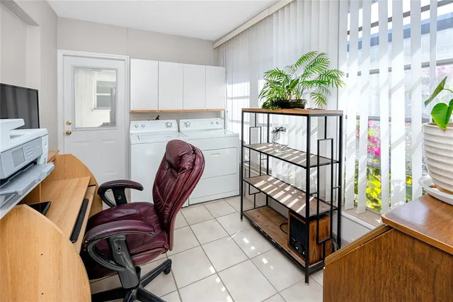 a view of a dining room with furniture window and flowerpot