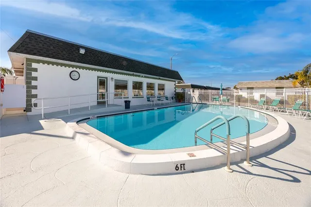 a view of a house with swimming pool
