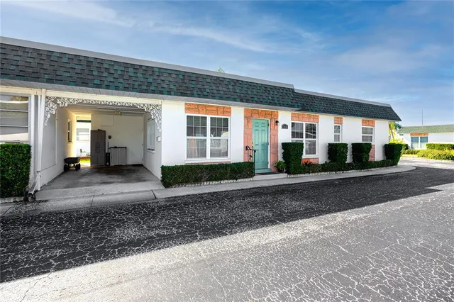 a view of a house with a street