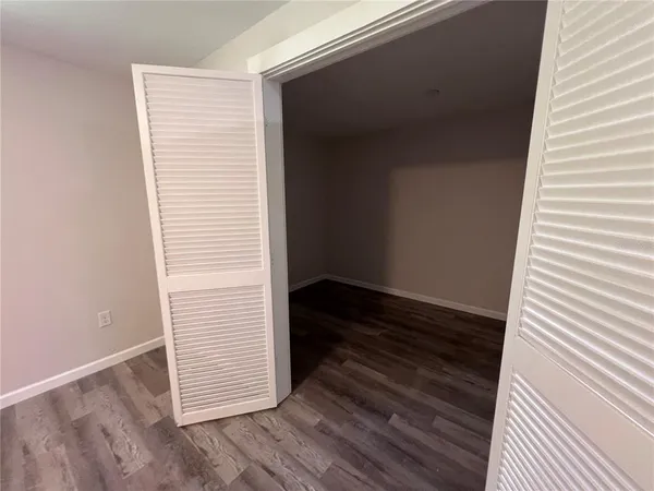 a view of a electric appliances in kitchen and empty room