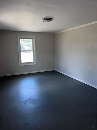 a view of a room with a window