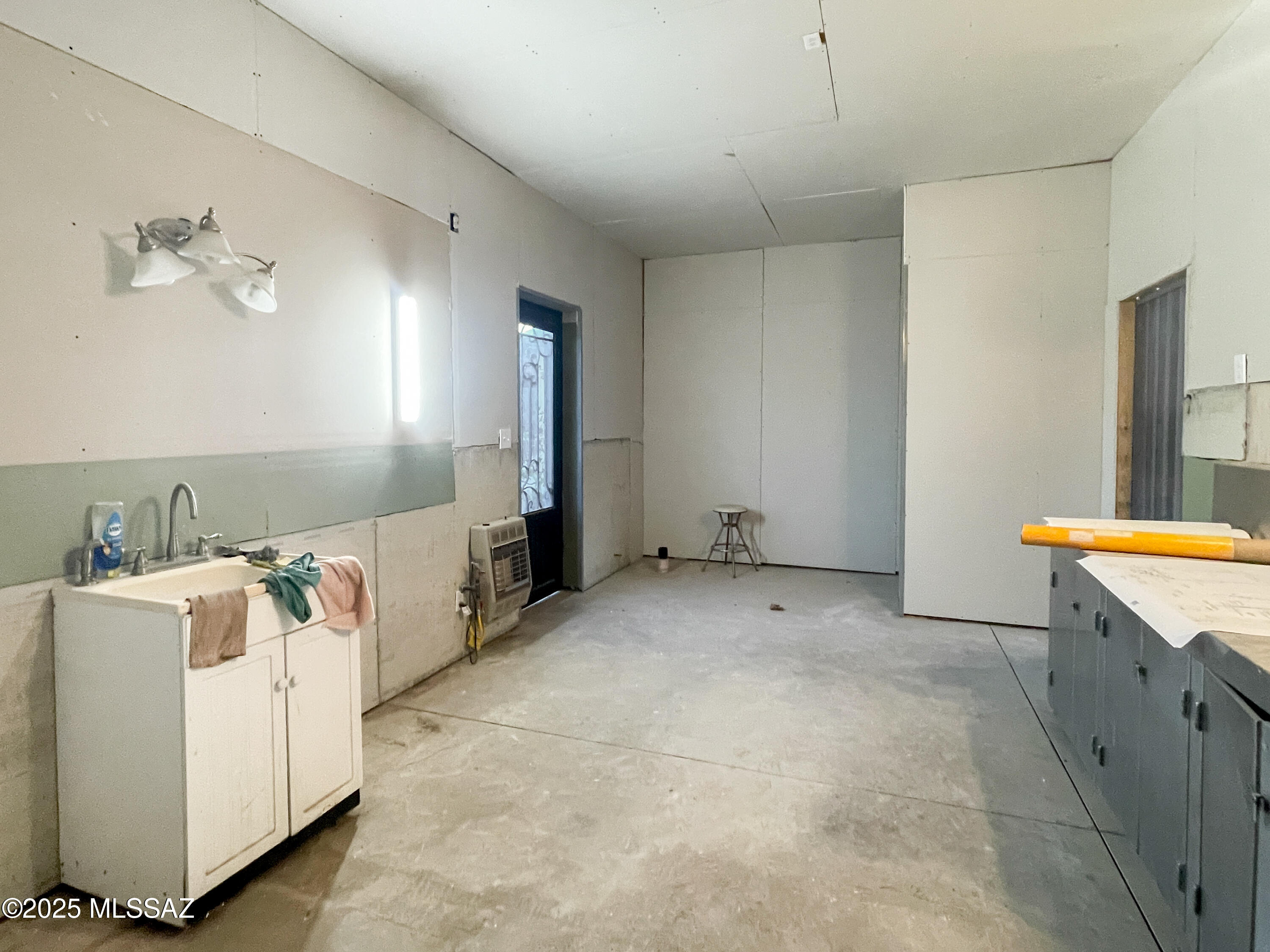 480 Camino Ramanote Rio Rico, AZ 85648 - Photo 42 of 43 Another view of supplemental kitchen with sink and plumbing for toilet and shower.
