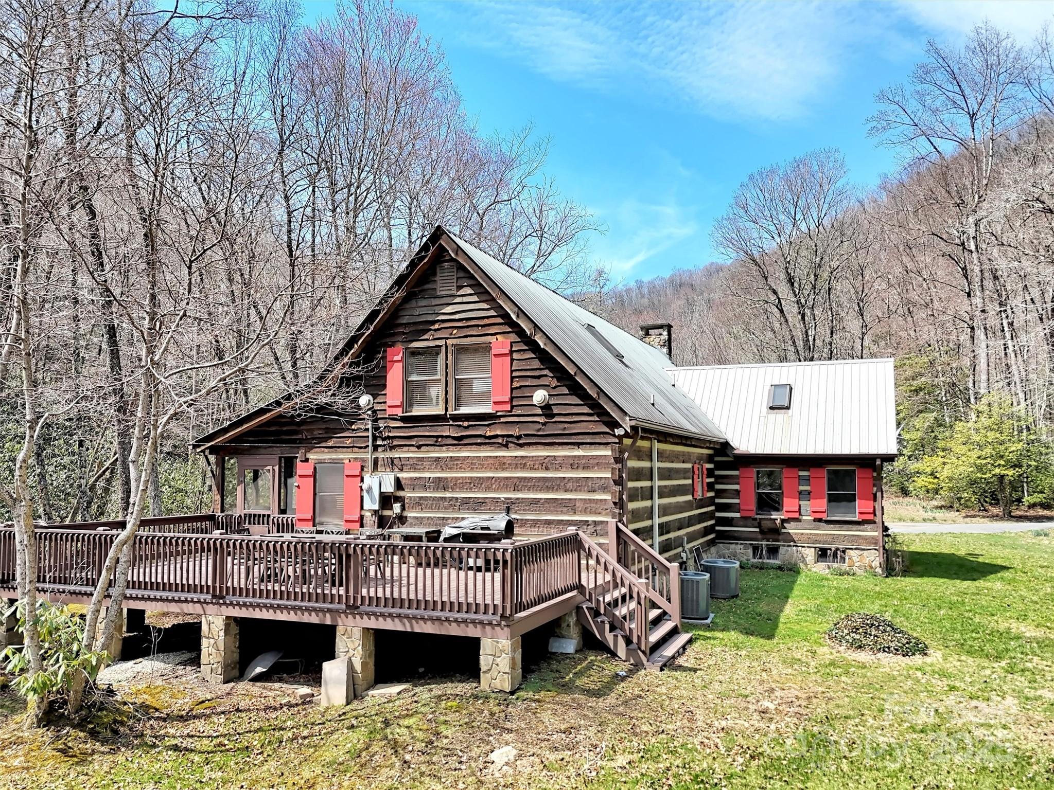 7810 Little Snowbird Road Robbinsville, NC 28771 - Photo 30 of 48 a view of house with outdoor seating area