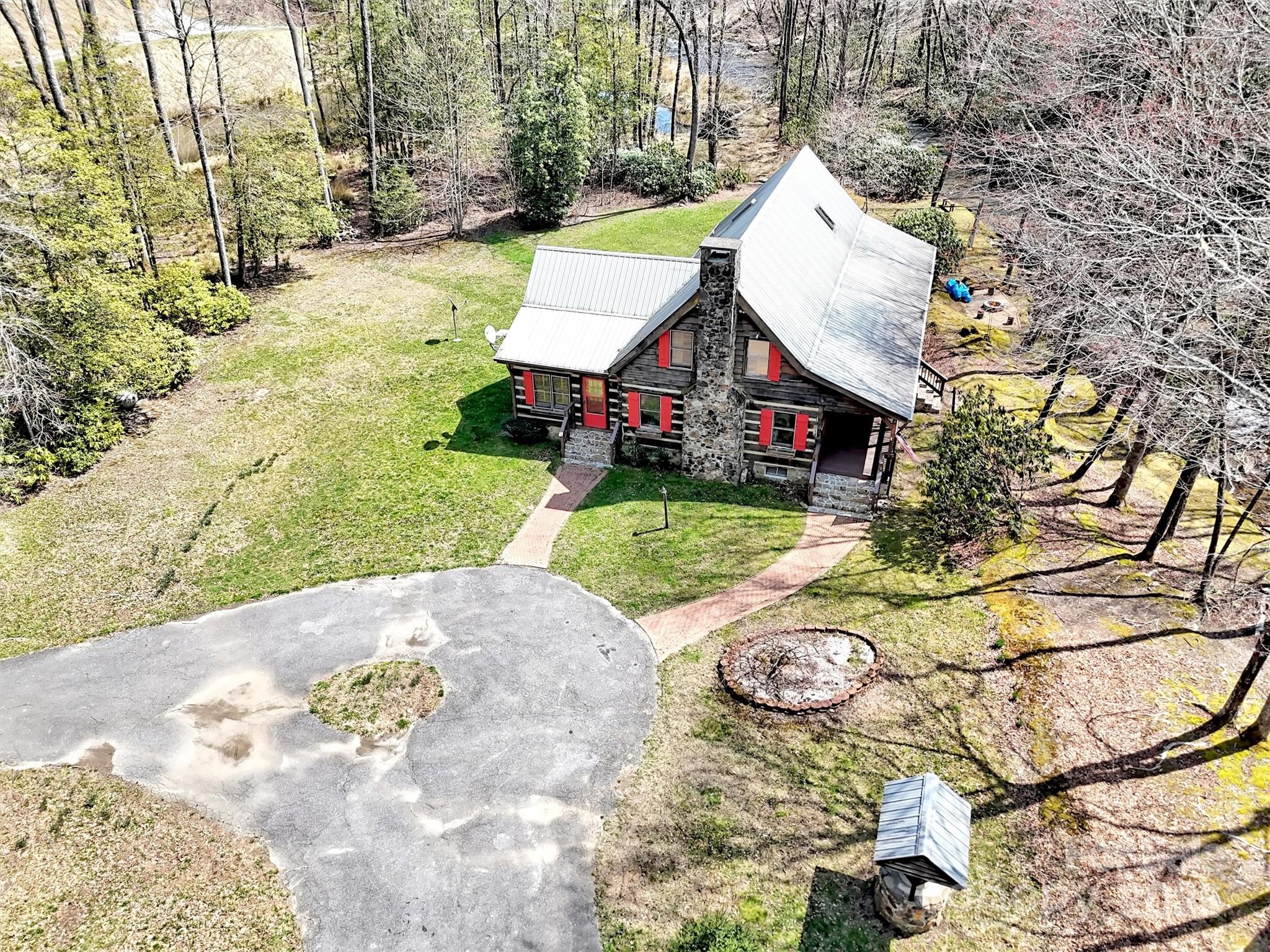7810 Little Snowbird Road Robbinsville, NC 28771 - Photo 35 of 48 a view of backyard with swimming pool