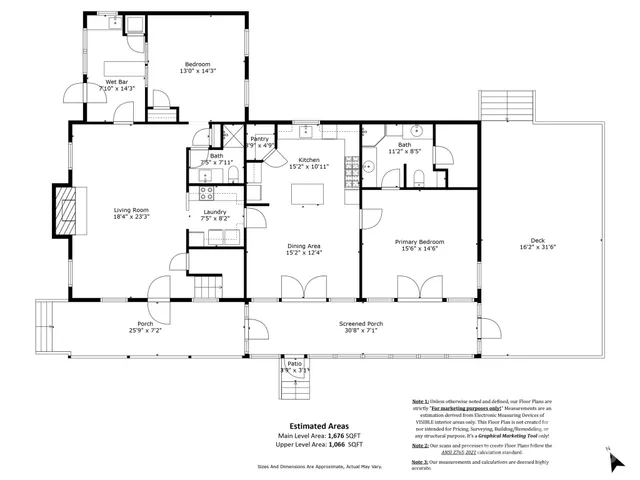 a kitchen with stainless steel appliances kitchen island granite countertop a stove a sink and a microwave