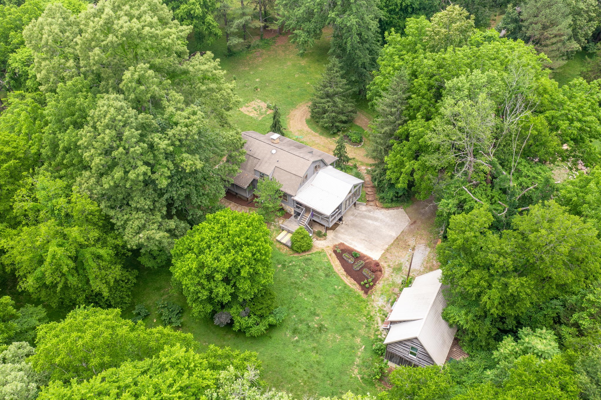 7803 Covington Road White House, TN 37188 - Photo 38 of 55 an aerial view of a house with a yard
