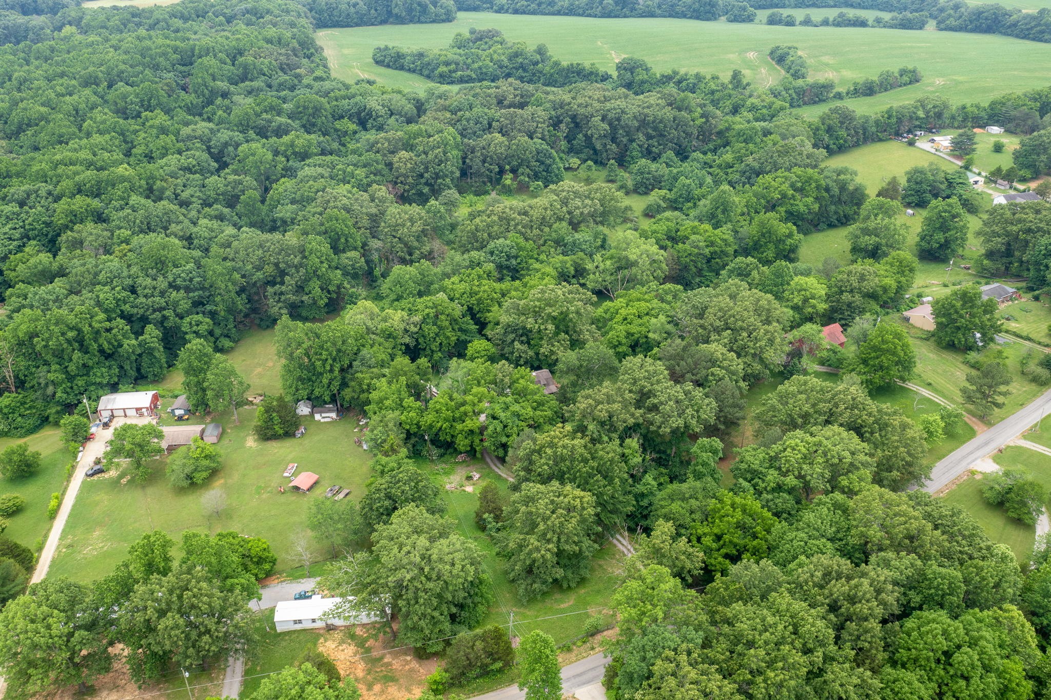 7803 Covington Road White House, TN 37188 - Photo 45 of 55 an aerial view of residential house with outdoor space and trees all around